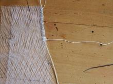 Obšívání lana s oběma díly sítě