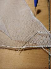 Obšívání lana u horní strany sítě (u lovného otvoru sítě)