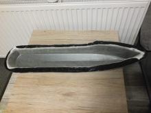 Trup ještě ve formě po odstřižení nepotřebné tkaniny