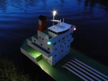 Osvětlený Velký Kačer u břehu